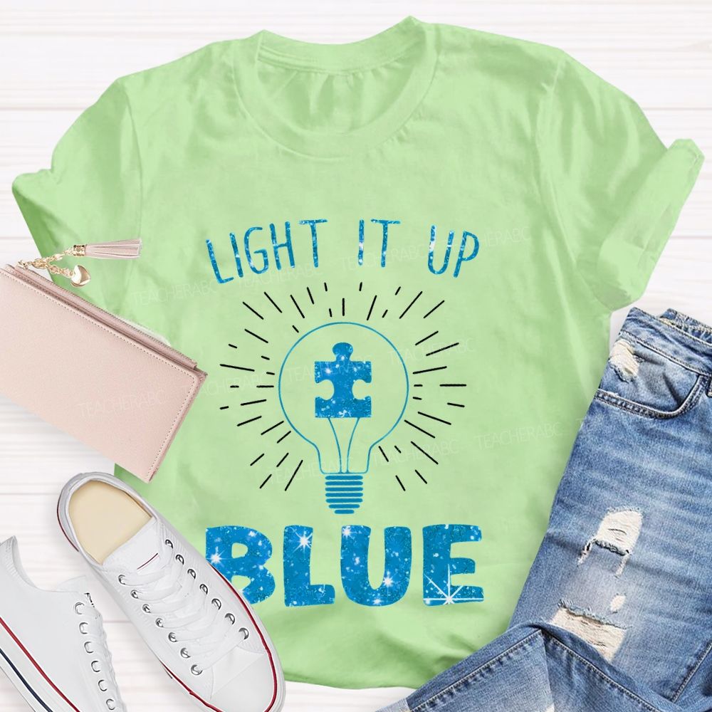 Light It Up Blue Light Bulb Graphic  Teacher T-shirt
