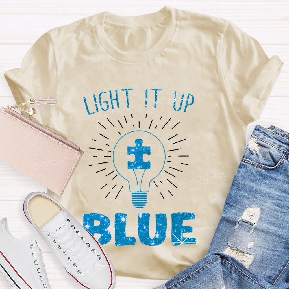 Light It Up Blue Light Bulb Graphic  Teacher T-shirt