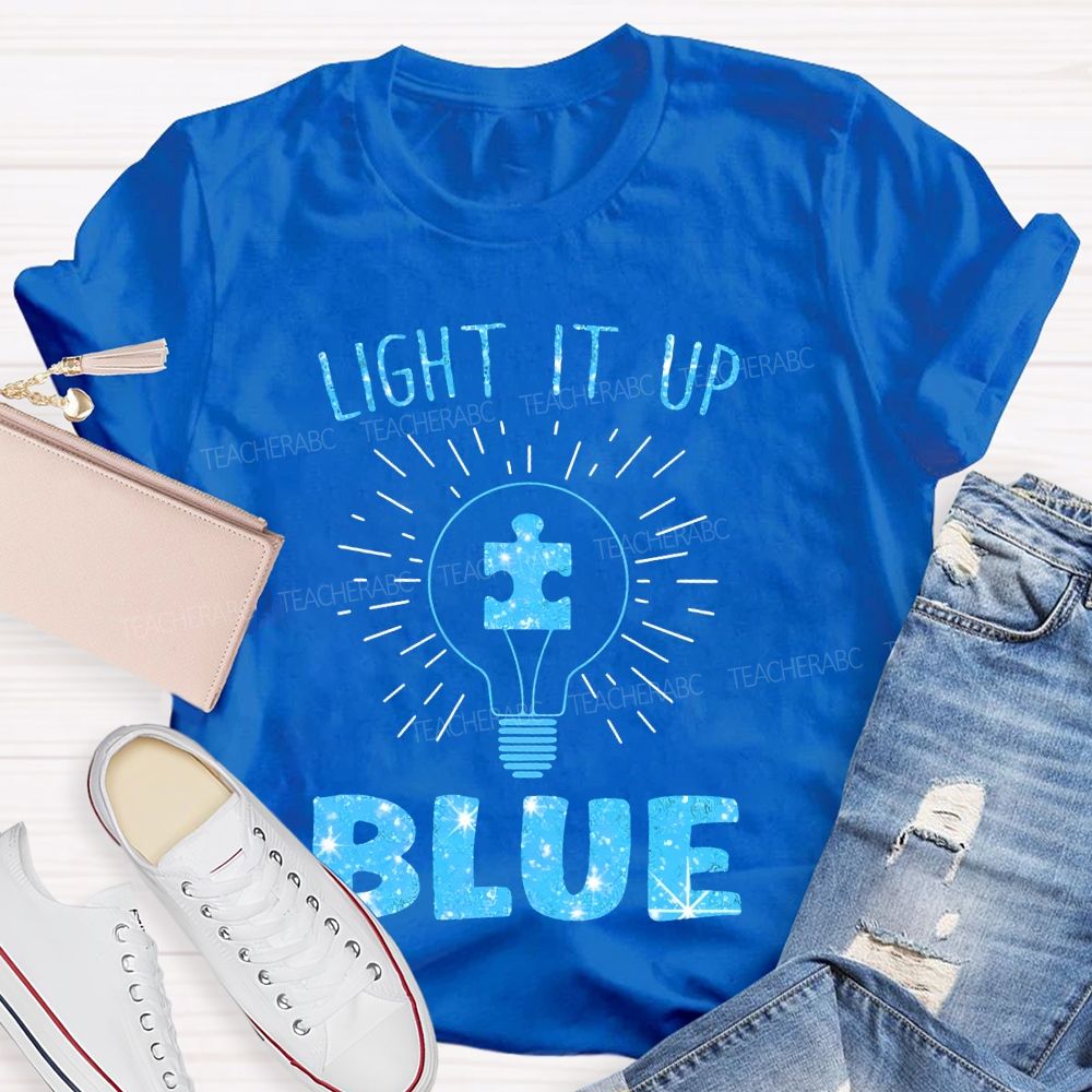 Light It Up Blue Light Bulb Graphic  Teacher T-shirt