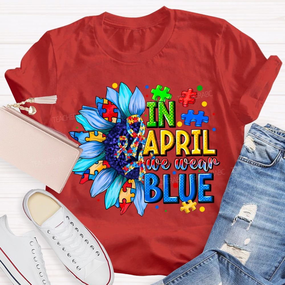In April We Wear Blue Autism Awareness Blue Sunflower Teacher T-shirt