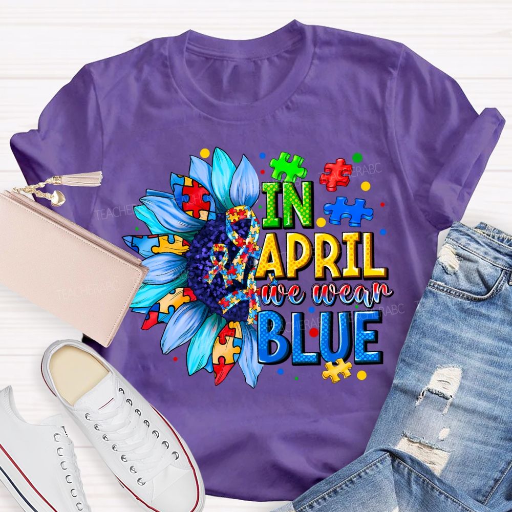 In April We Wear Blue Autism Awareness Blue Sunflower Teacher T-shirt