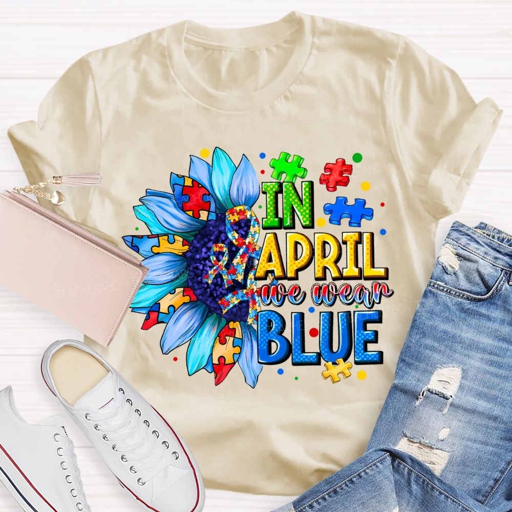 In April We Wear Blue Autism Awareness Blue Sunflower Teacher T-shirt