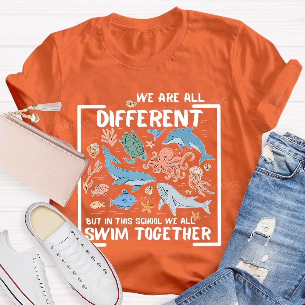 We Are All Different But In This School We All Swim Together Graphic  Teacher T-shirt