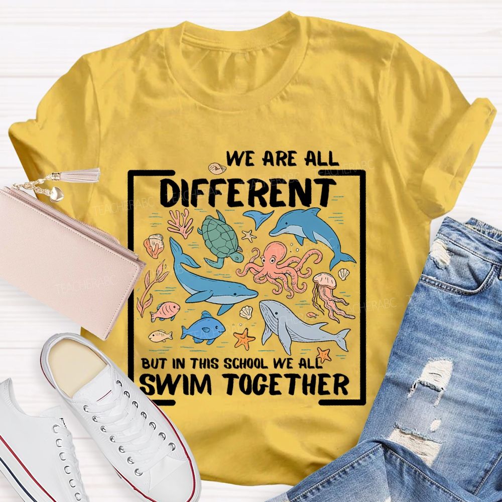 We Are All Different But In This School We All Swim Together Graphic  Teacher T-shirt