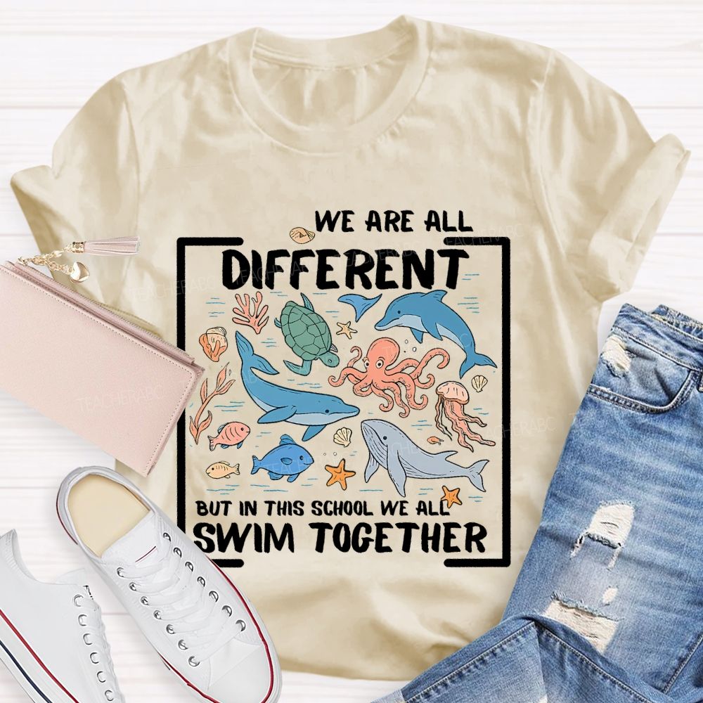 We Are All Different But In This School We All Swim Together Graphic  Teacher T-shirt
