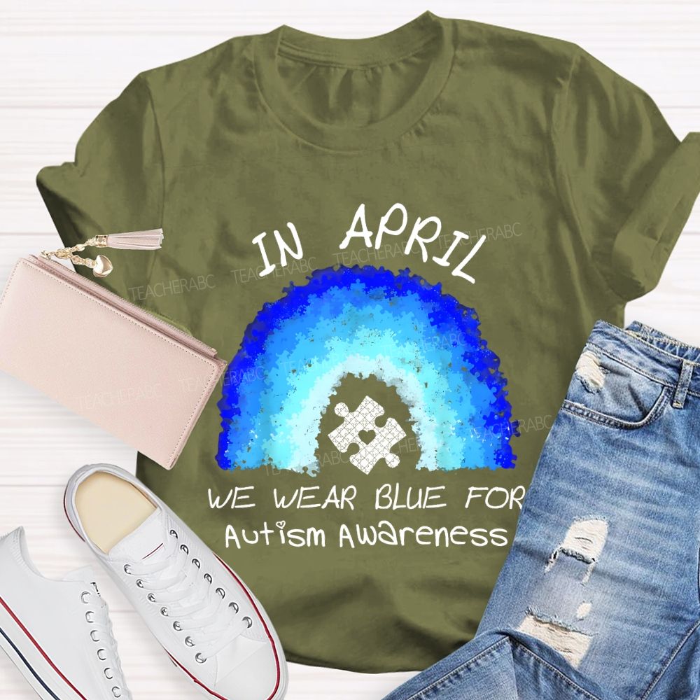In April We Wear Blue For Autism Awareness Rainbow Puzzle Pattern  Teacher T-shirt