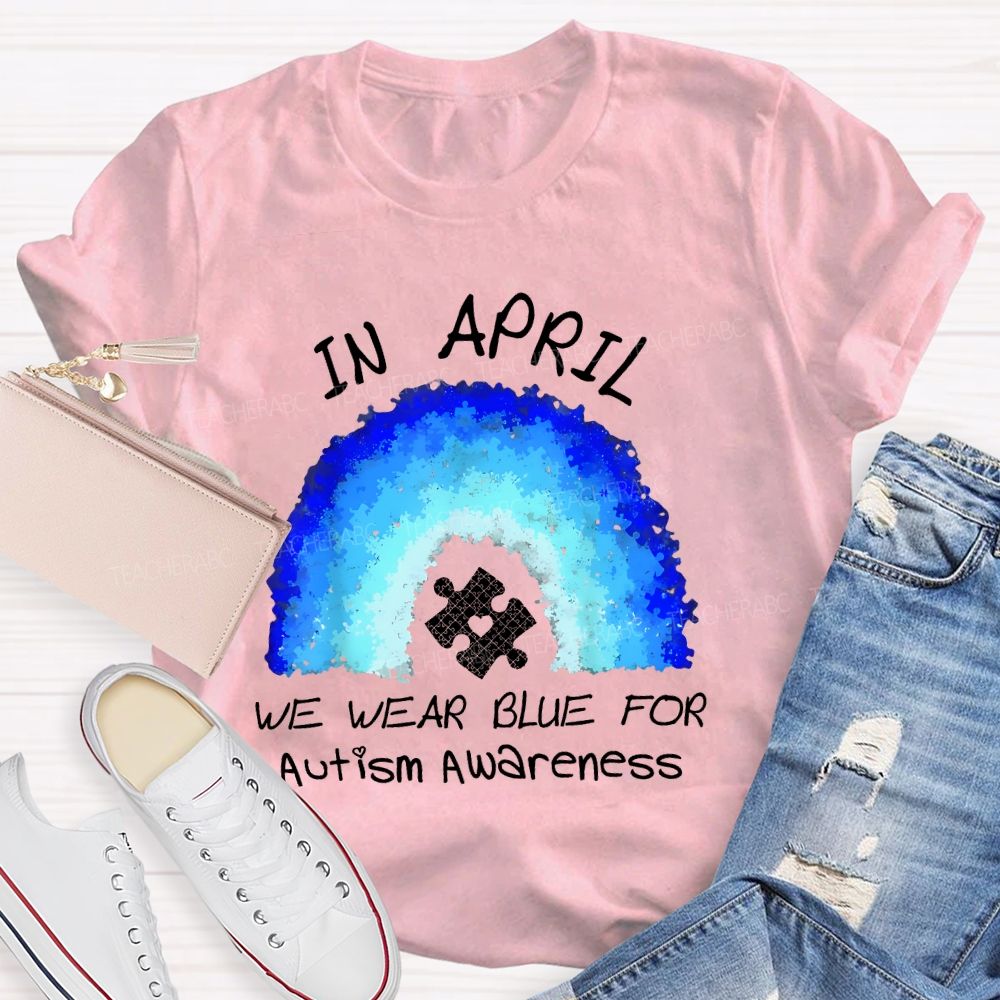 In April We Wear Blue For Autism Awareness Rainbow Puzzle Pattern  Teacher T-shirt