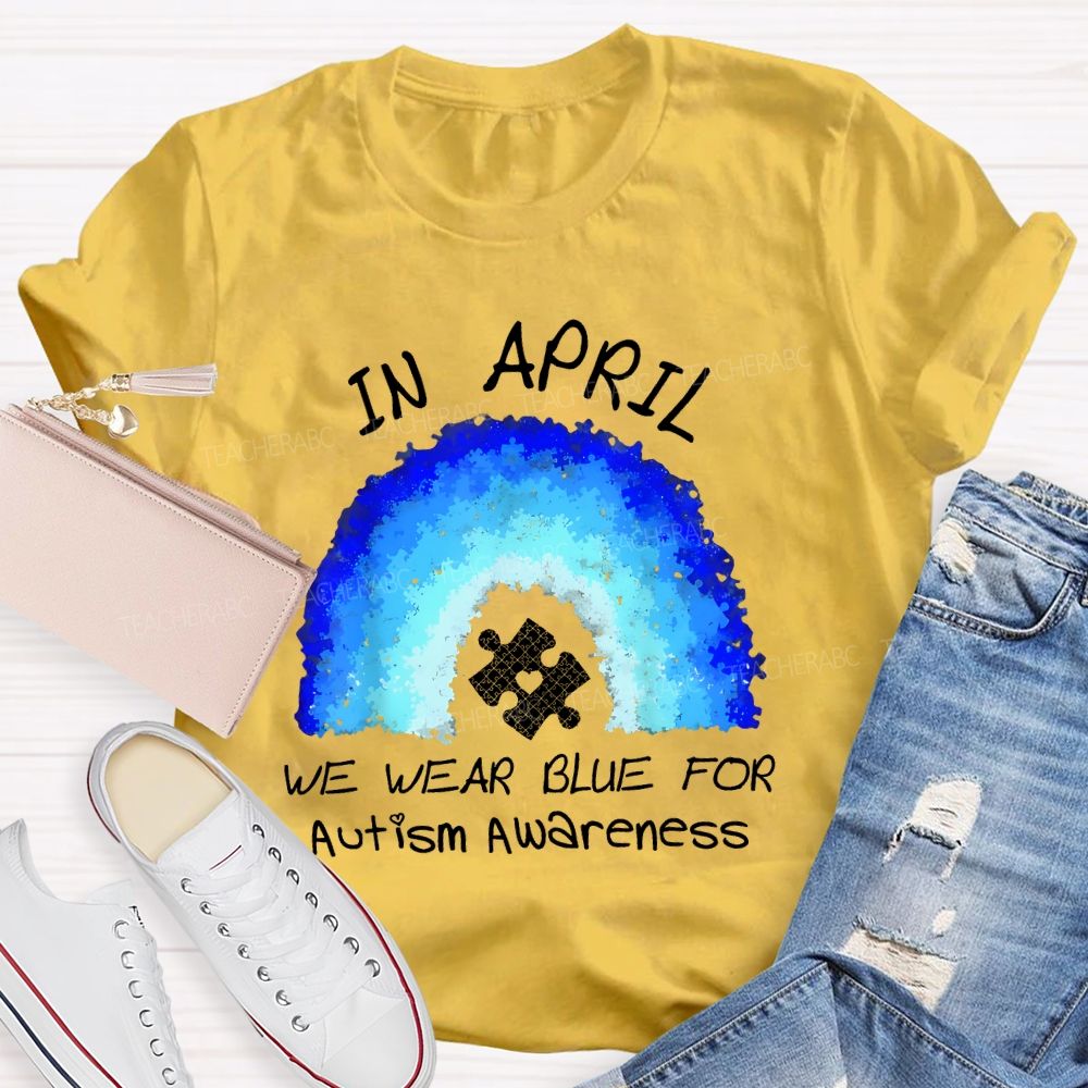 In April We Wear Blue For Autism Awareness Rainbow Puzzle Pattern  Teacher T-shirt