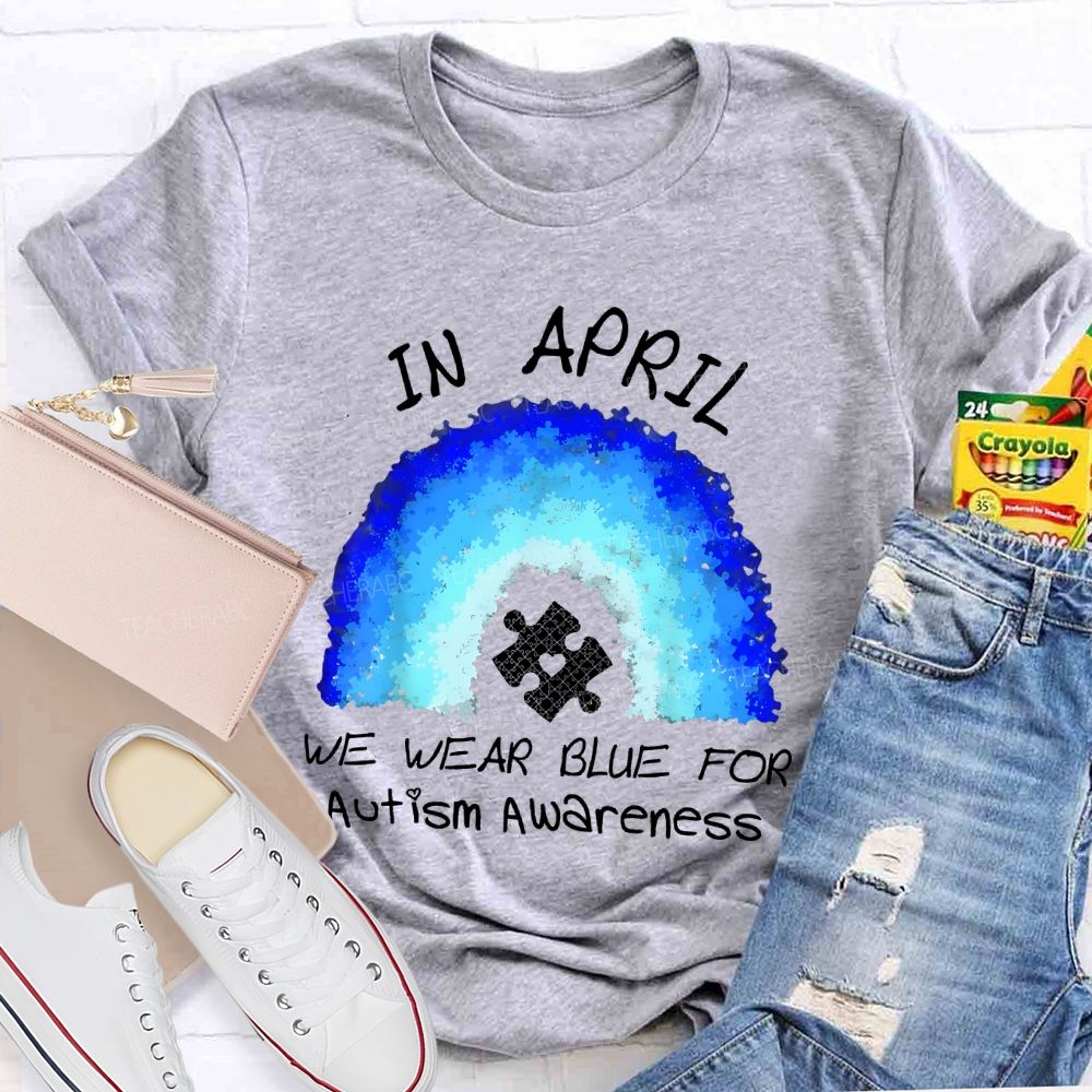 In April We Wear Blue For Autism Awareness Rainbow Puzzle Pattern  Teacher T-shirt