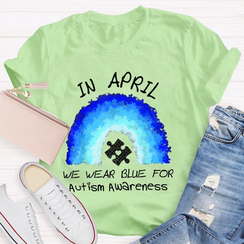In April We Wear Blue For Autism Awareness Rainbow Puzzle Pattern  Teacher T-shirt