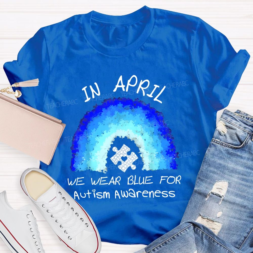 In April We Wear Blue For Autism Awareness Rainbow Puzzle Pattern  Teacher T-shirt