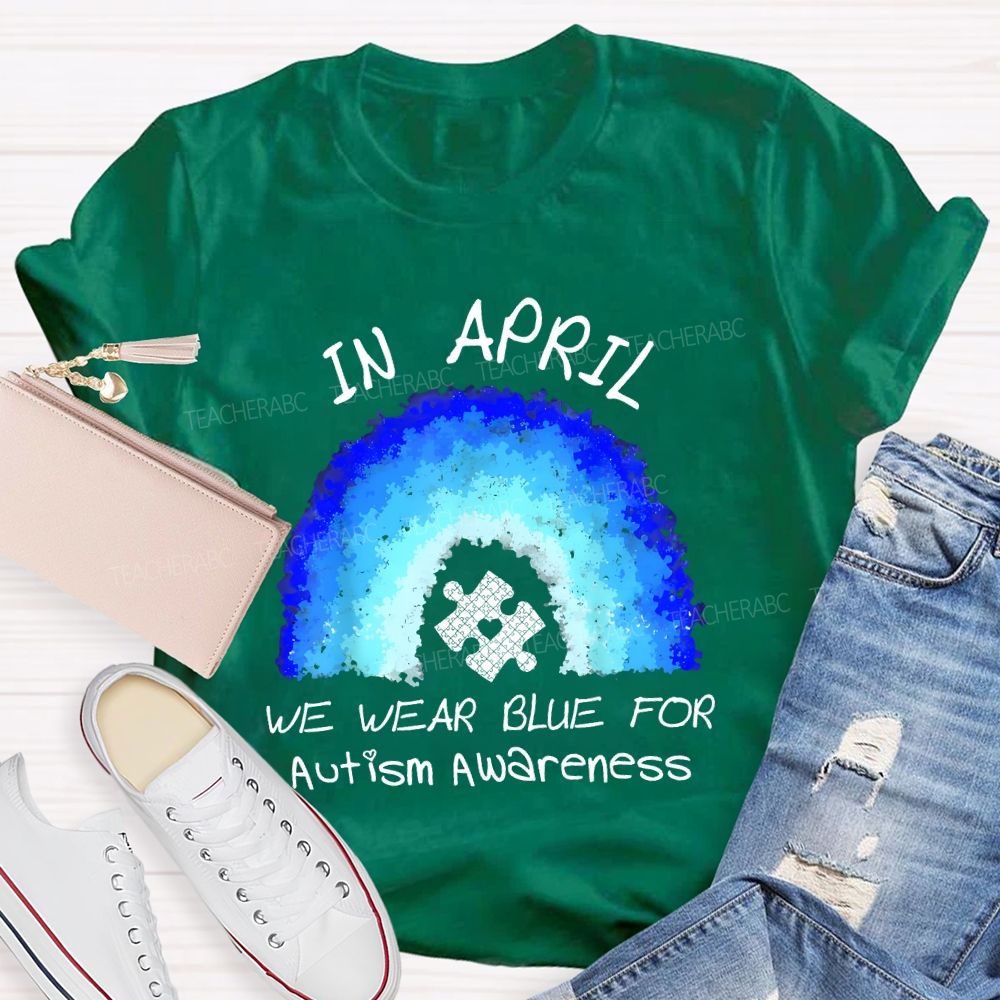 In April We Wear Blue For Autism Awareness Rainbow Puzzle Pattern  Teacher T-shirt
