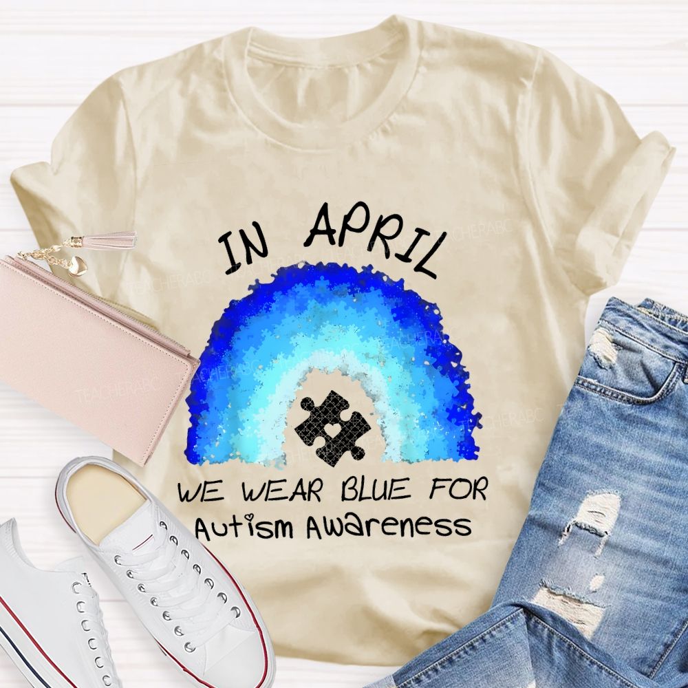 In April We Wear Blue For Autism Awareness Rainbow Puzzle Pattern  Teacher T-shirt