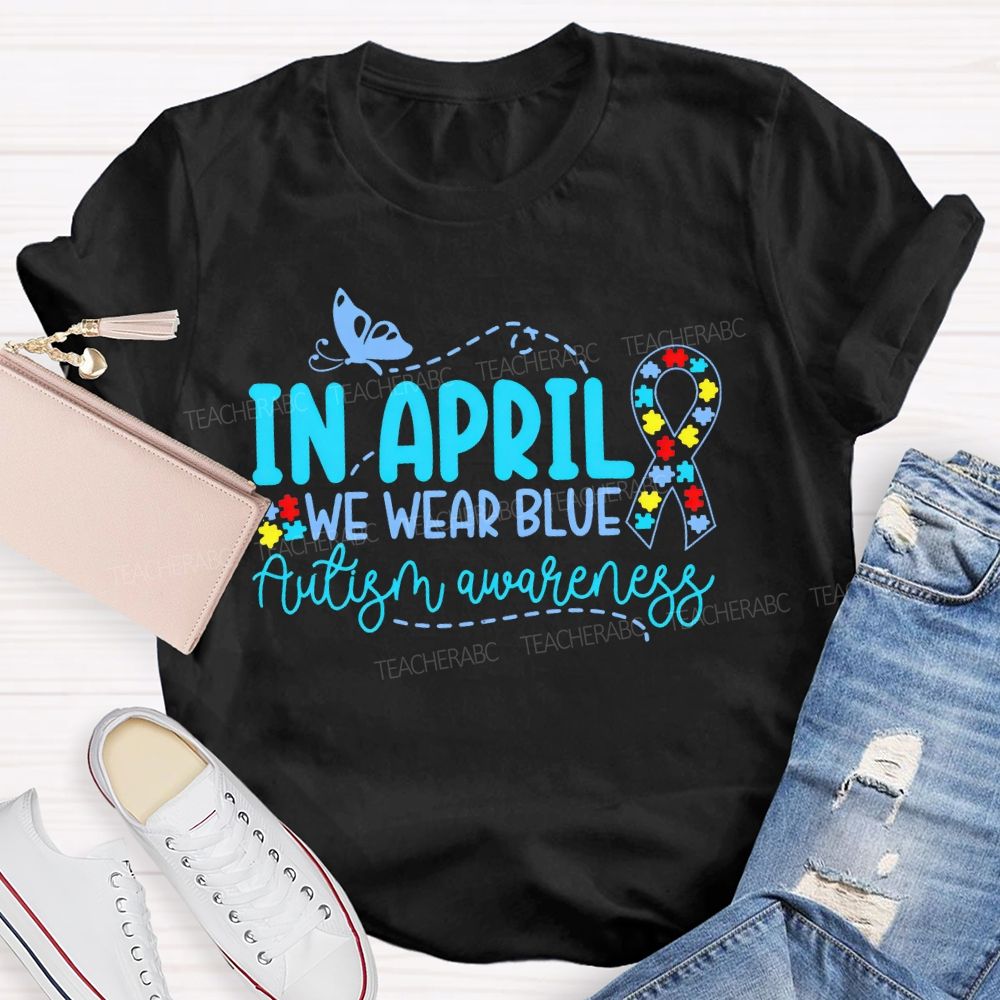 In April We Wear Blue  Autism Awareness Puzzle Ribbon  Teacher T-shirt
