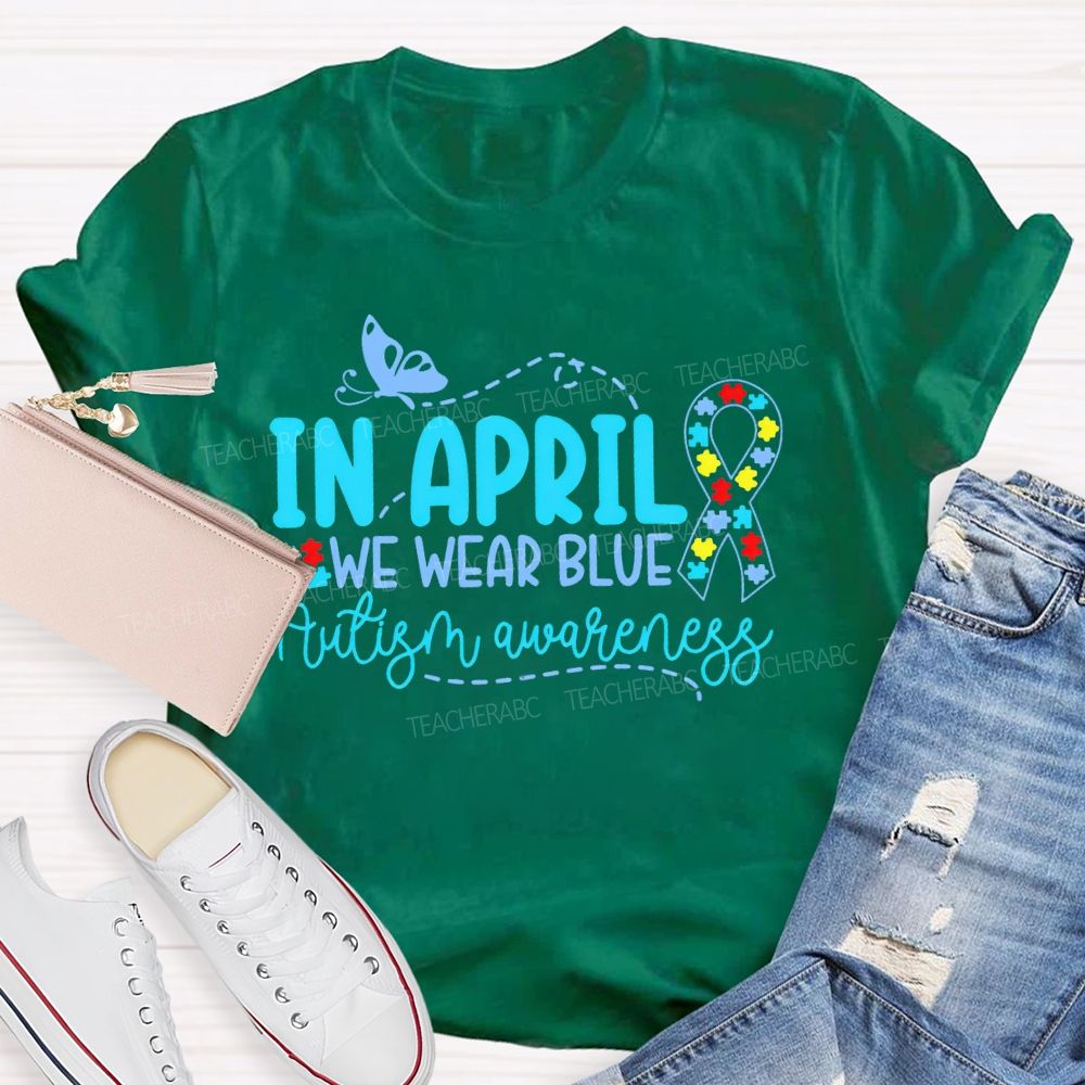 In April We Wear Blue  Autism Awareness Puzzle Ribbon  Teacher T-shirt