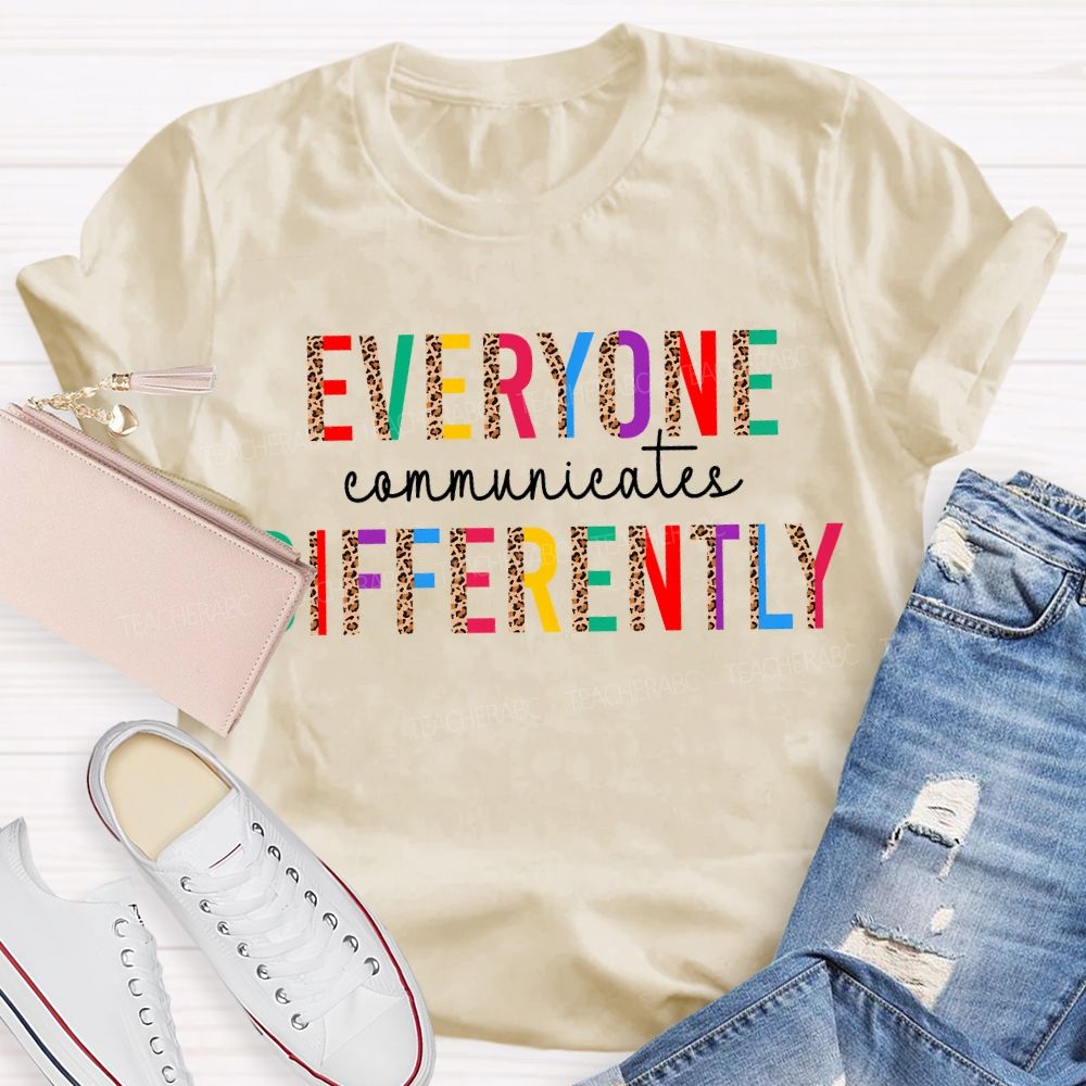 Everyone Communicates Differently Leopard Print And Colored Fonts T-shirt