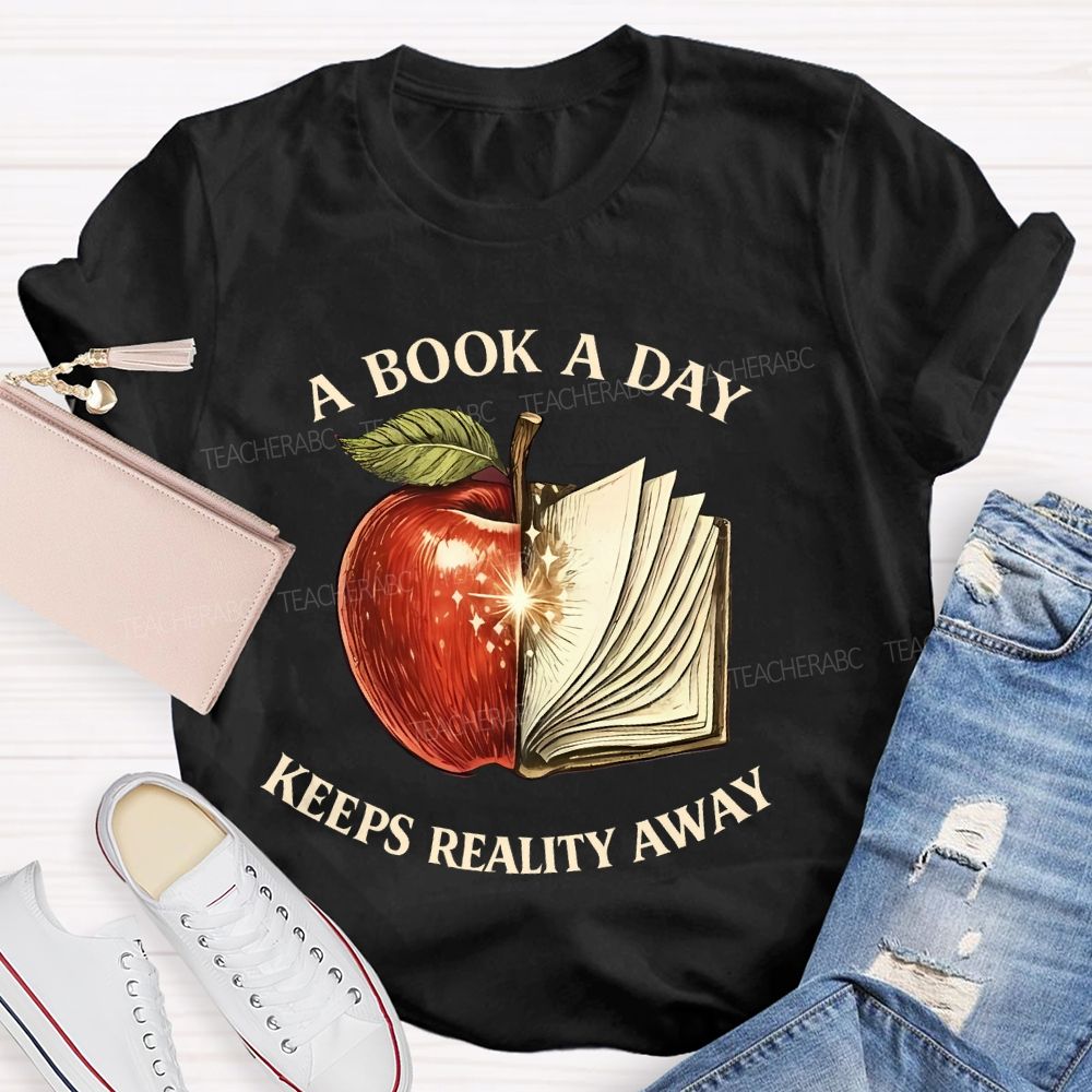 A Book A Day Keeps Reality Away Graphic  Teacher T-shirt