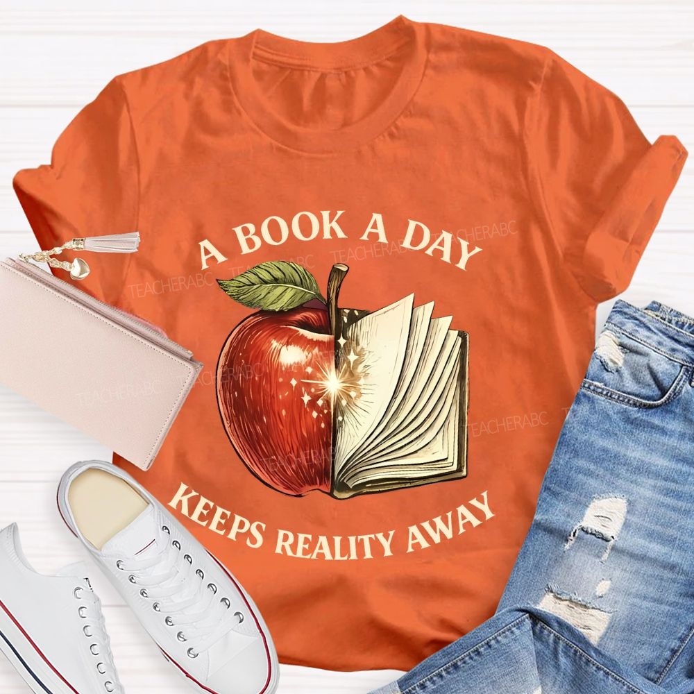 A Book A Day Keeps Reality Away Graphic  Teacher T-shirt