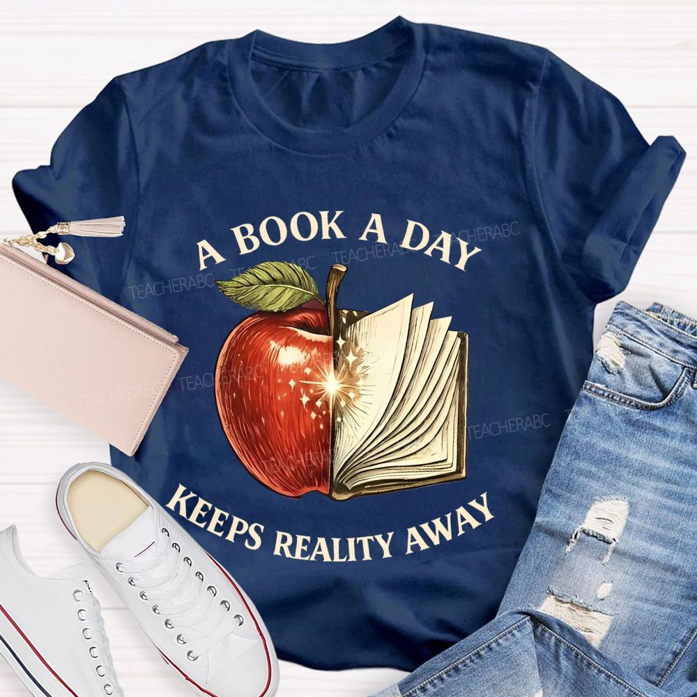 A Book A Day Keeps Reality Away Graphic  Teacher T-shirt