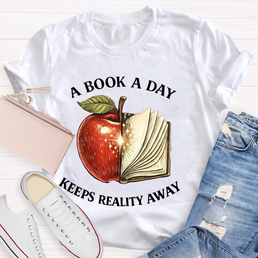 A Book A Day Keeps Reality Away Graphic  Teacher T-shirt