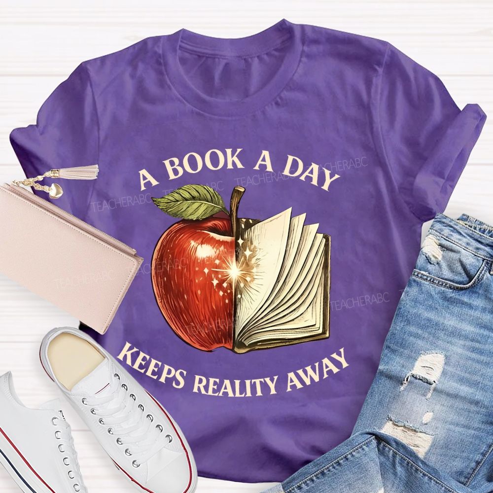 A Book A Day Keeps Reality Away Graphic  Teacher T-shirt