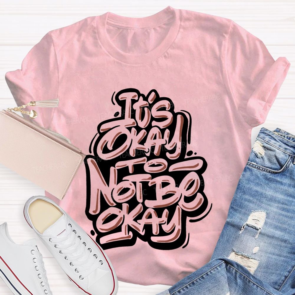 It's Okay To Not Be Okay Letters Graphics  Teacher T-shirt
