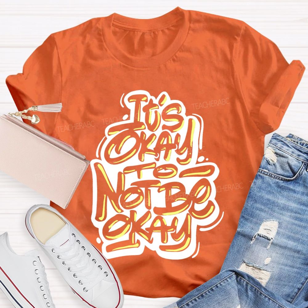It's Okay To Not Be Okay Letters Graphics  Teacher T-shirt