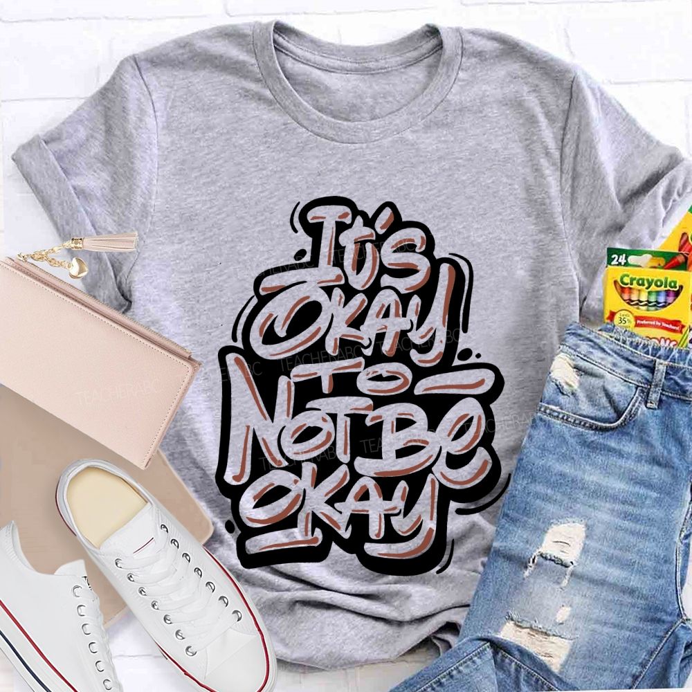It's Okay To Not Be Okay Letters Graphics  Teacher T-shirt