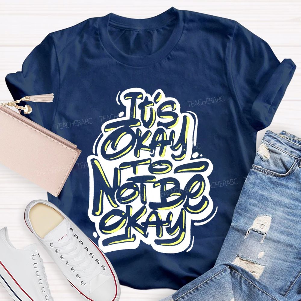 It's Okay To Not Be Okay Letters Graphics  Teacher T-shirt