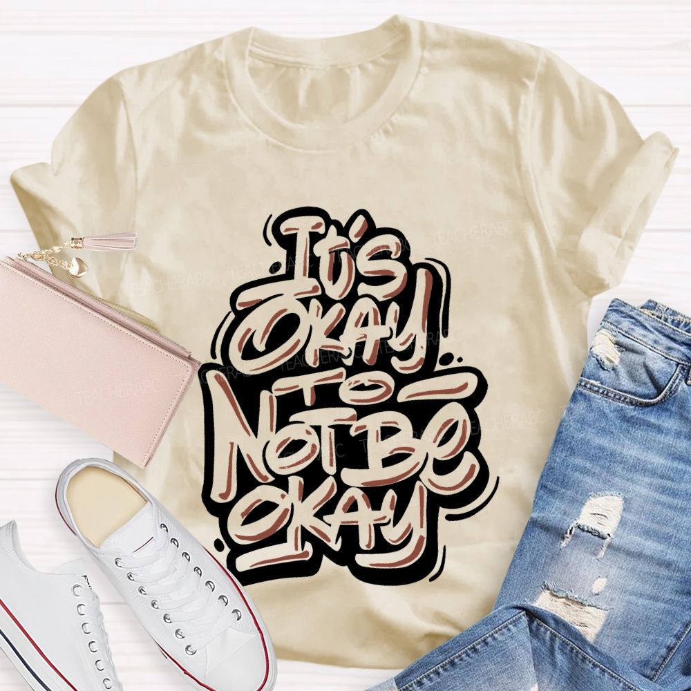 It's Okay To Not Be Okay Letters Graphics  Teacher T-shirt