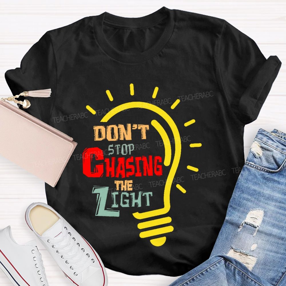 Don't Stop Chasing The Light  Teacher T-shirt