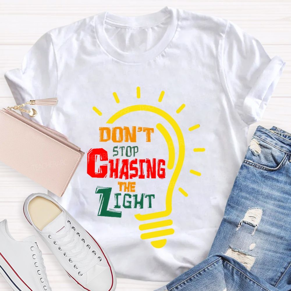 Don't Stop Chasing The Light  Teacher T-shirt