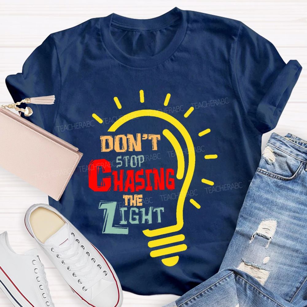 Don't Stop Chasing The Light  Teacher T-shirt