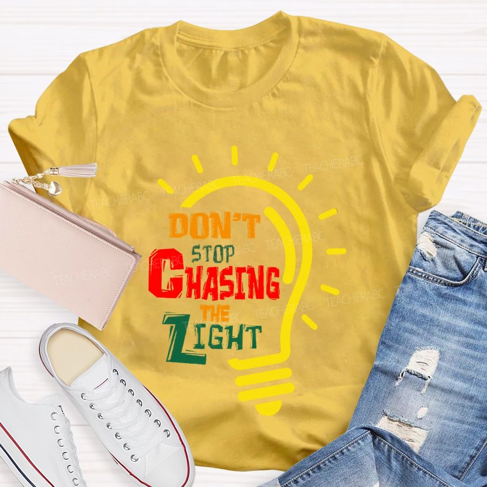 Don't Stop Chasing The Light  Teacher T-shirt