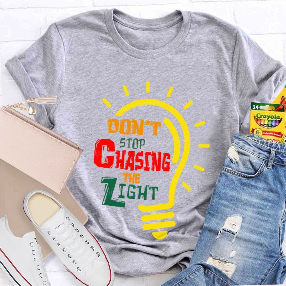 Don't Stop Chasing The Light  Teacher T-shirt
