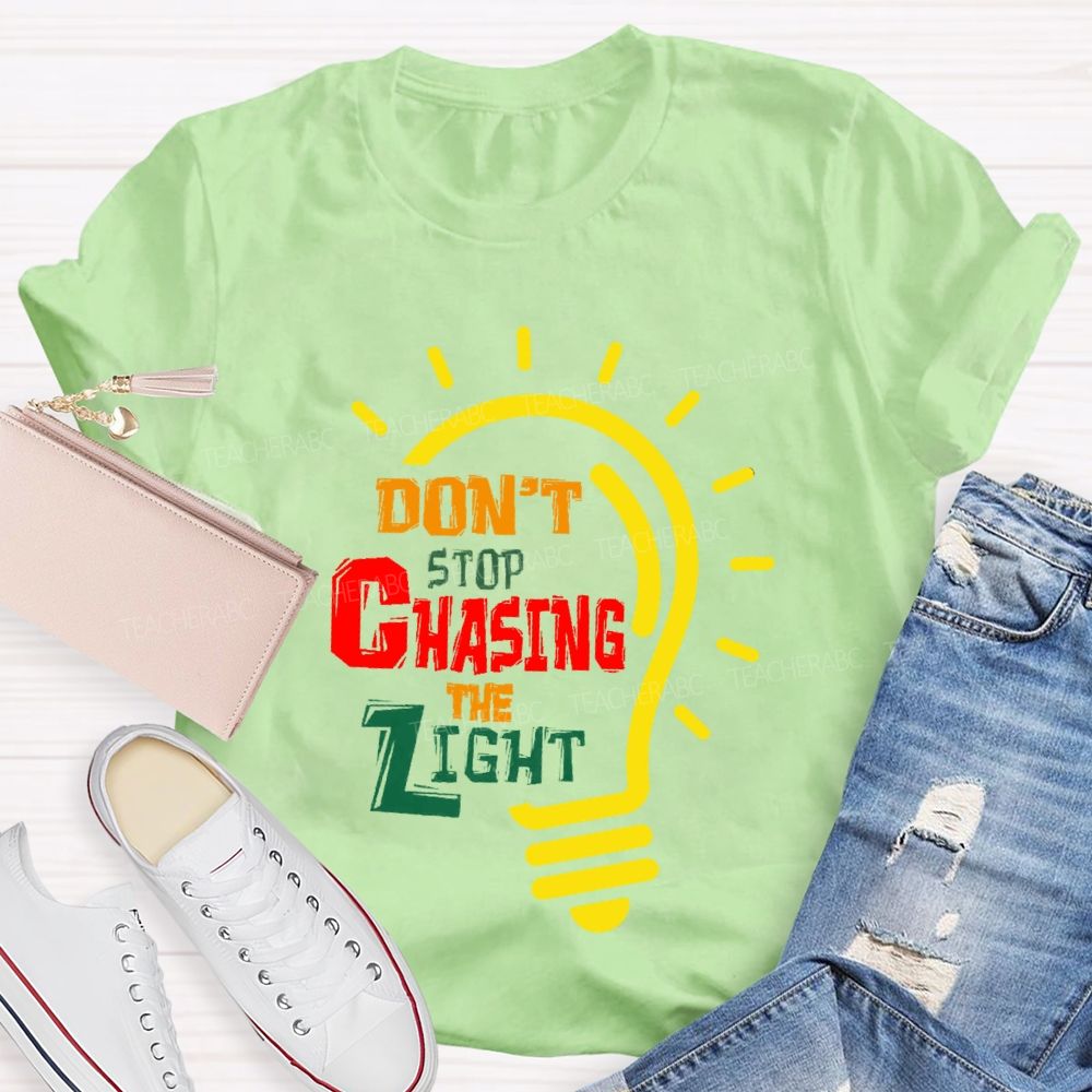 Don't Stop Chasing The Light  Teacher T-shirt