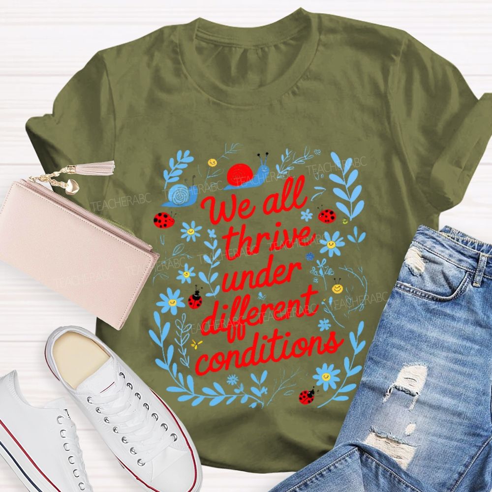 We All Thrive Under Different Conditions Graphic  Teacher T-shirt
