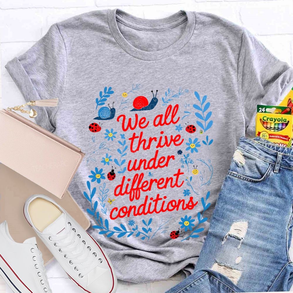 We All Thrive Under Different Conditions Graphic  Teacher T-shirt
