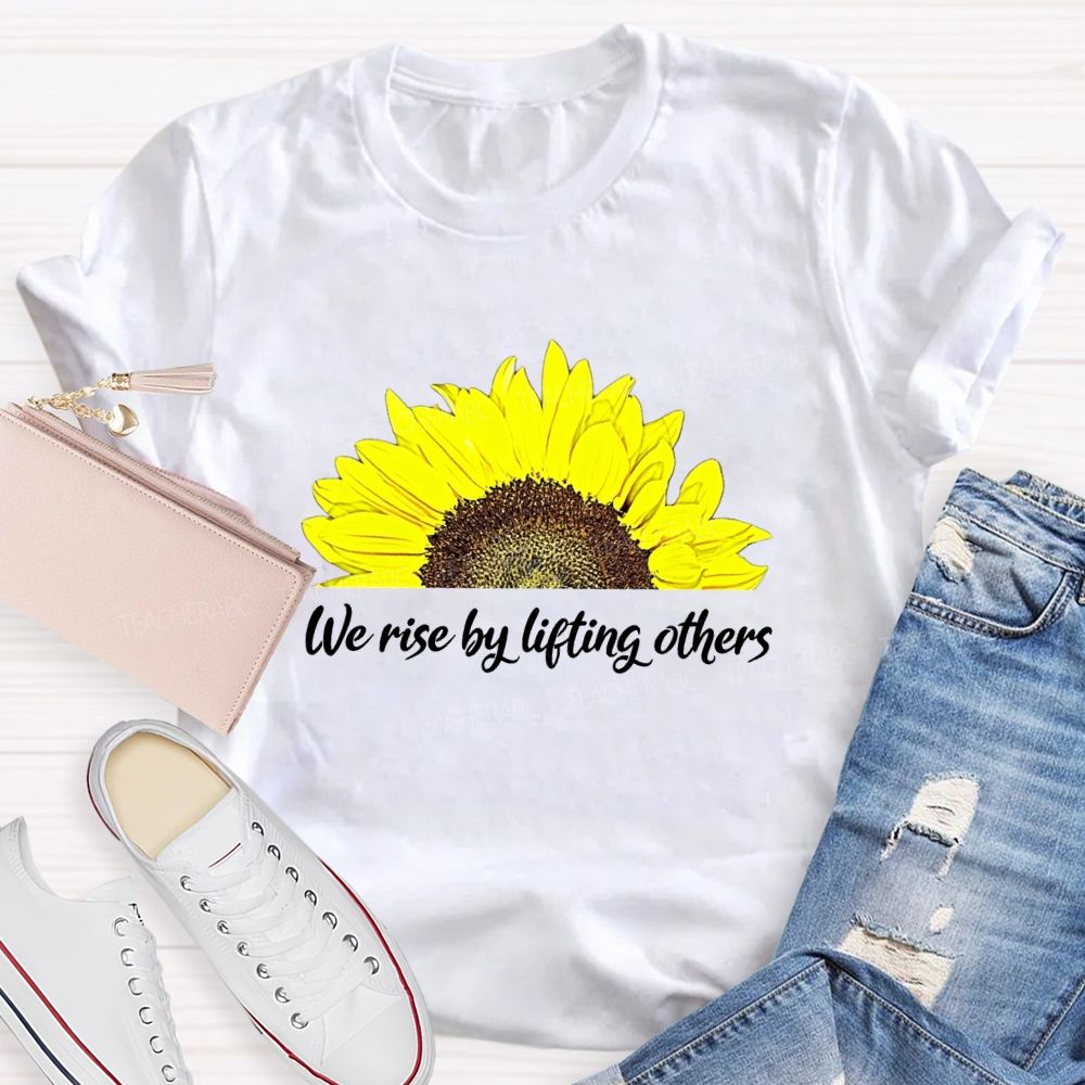 The Rise By Lifting Others Teacher T-shirt