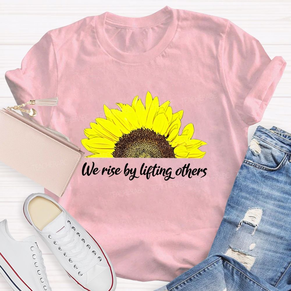The Rise By Lifting Others Teacher T-shirt