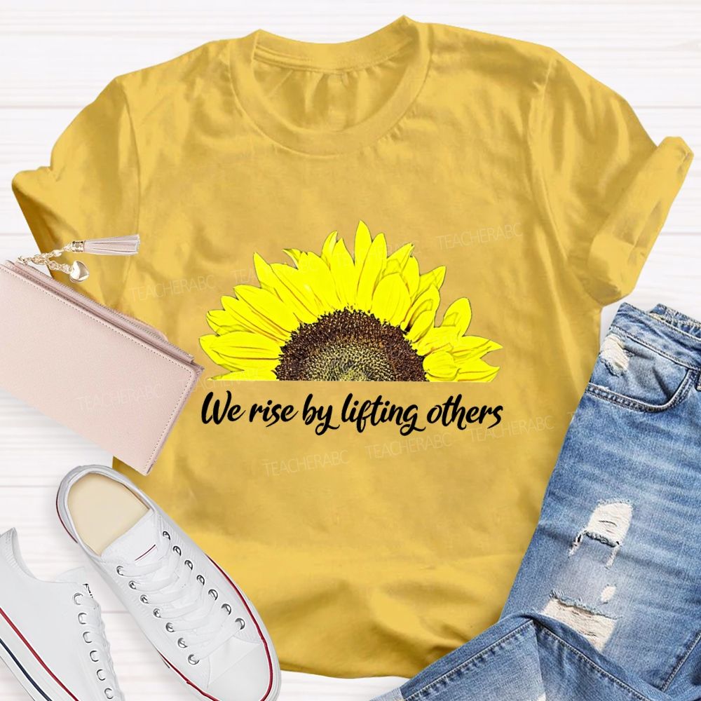 The Rise By Lifting Others Teacher T-shirt