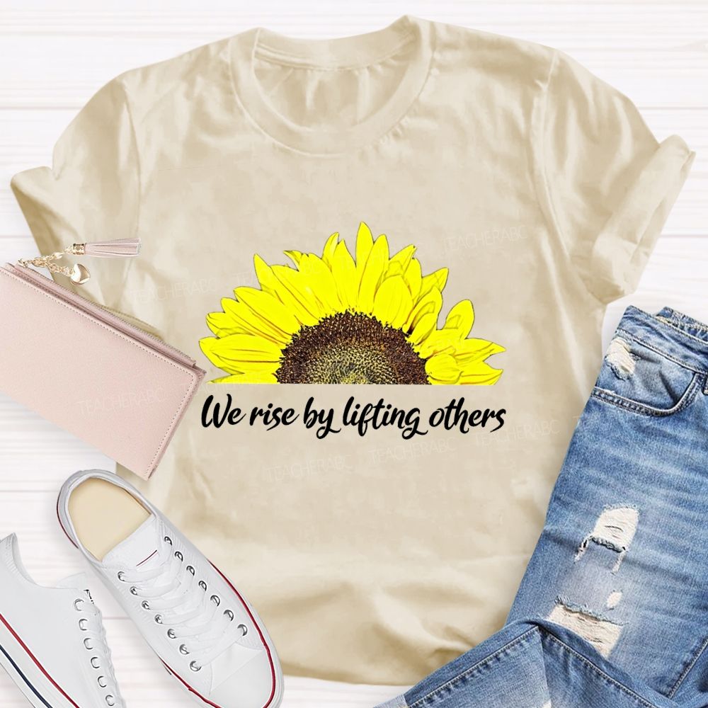 The Rise By Lifting Others Teacher T-shirt