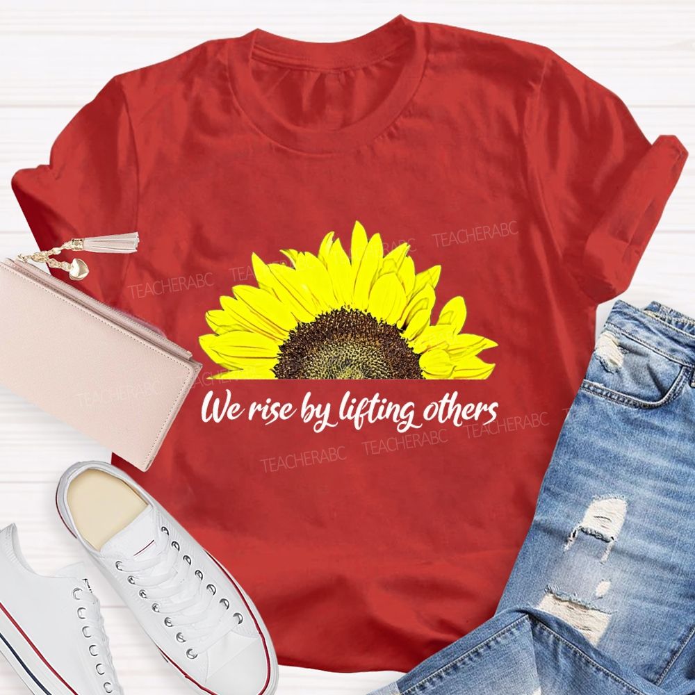 The Rise By Lifting Others Teacher T-shirt