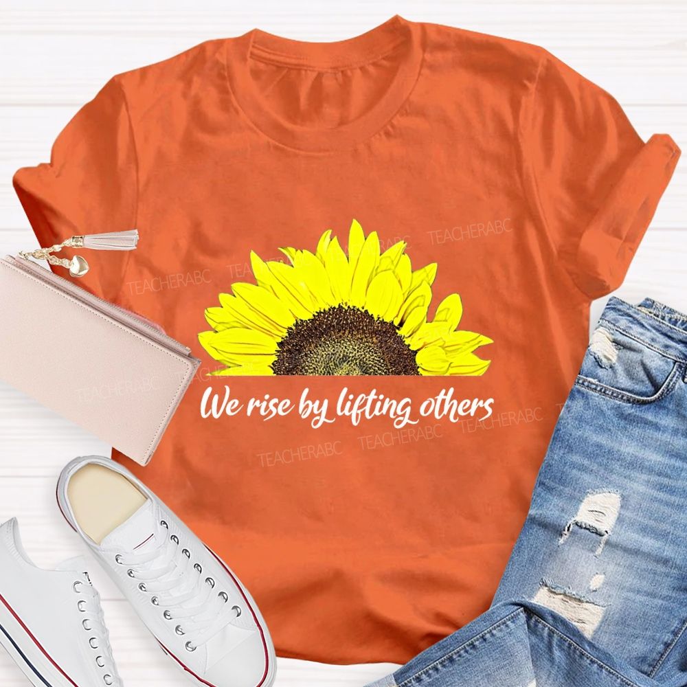 The Rise By Lifting Others Teacher T-shirt