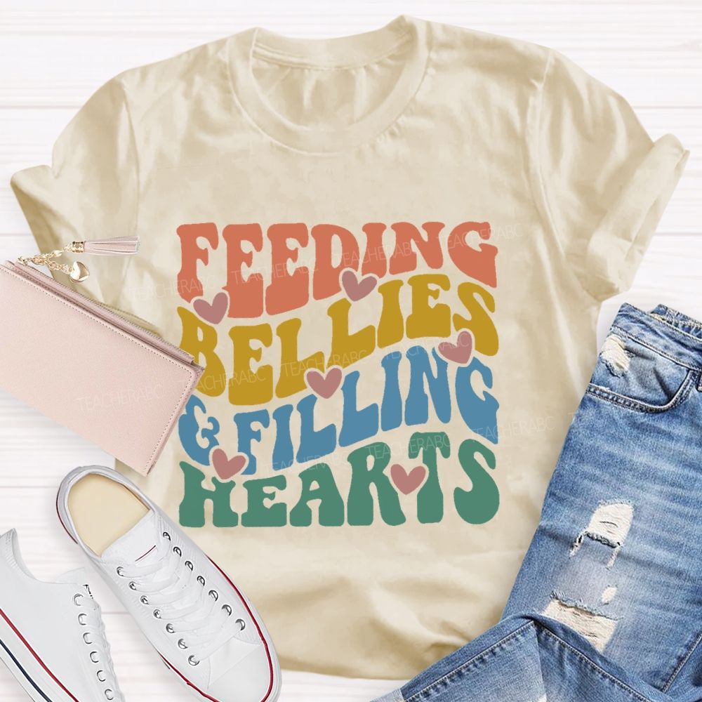Feeding Bellies  Filling Hearts Colorful Letters  Teacher T-shirt