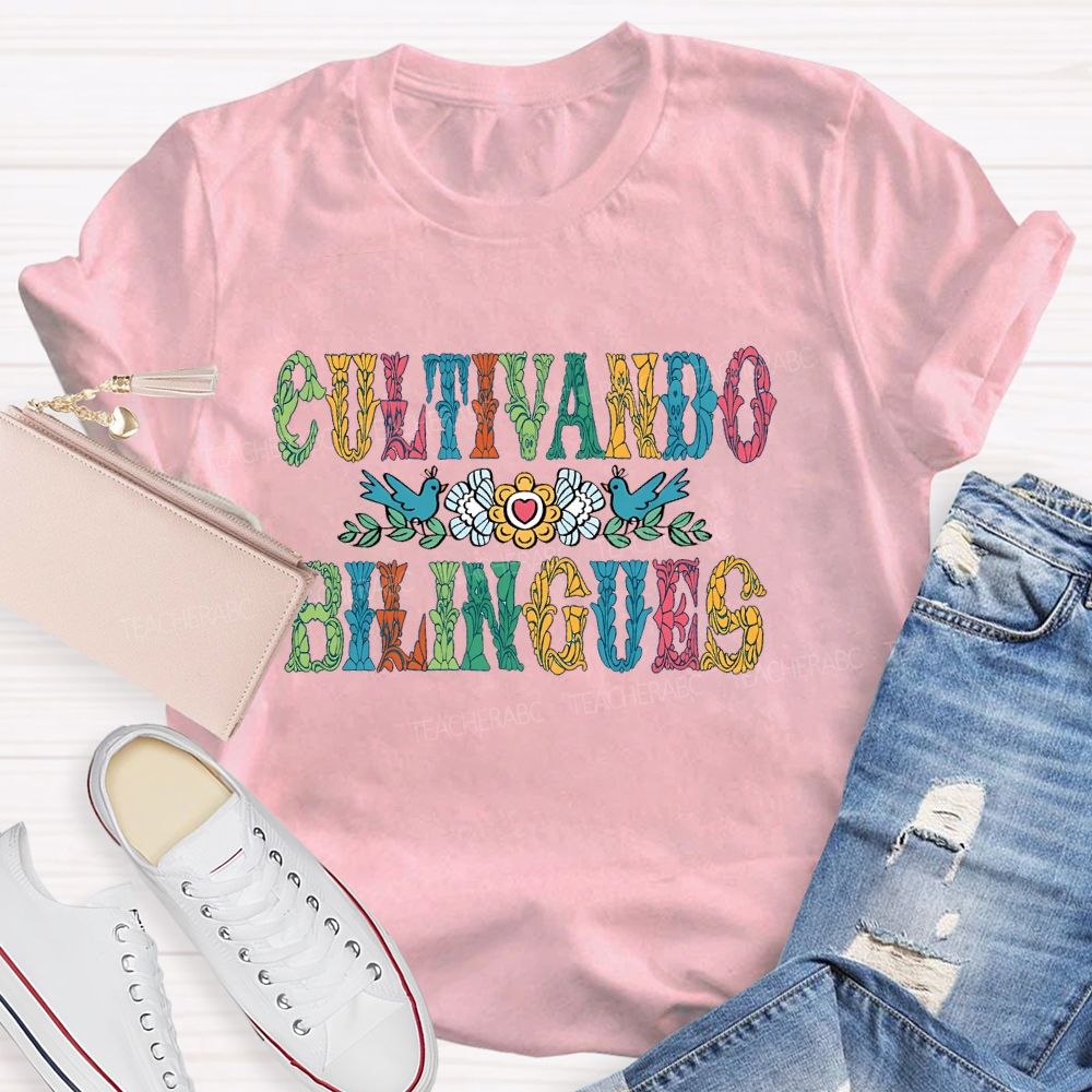Cultivando Bilingues Colorful Letters  Teacher T-shirt
