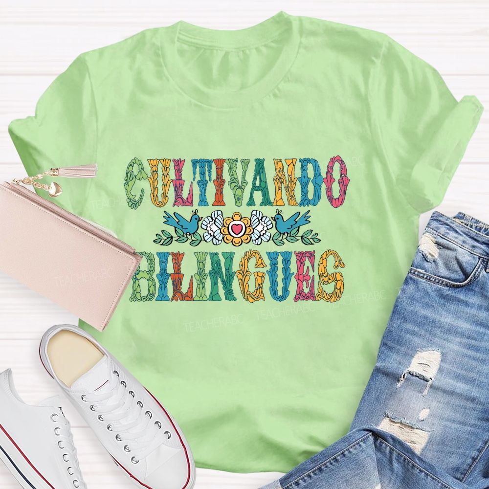 Cultivando Bilingues Colorful Letters  Teacher T-shirt