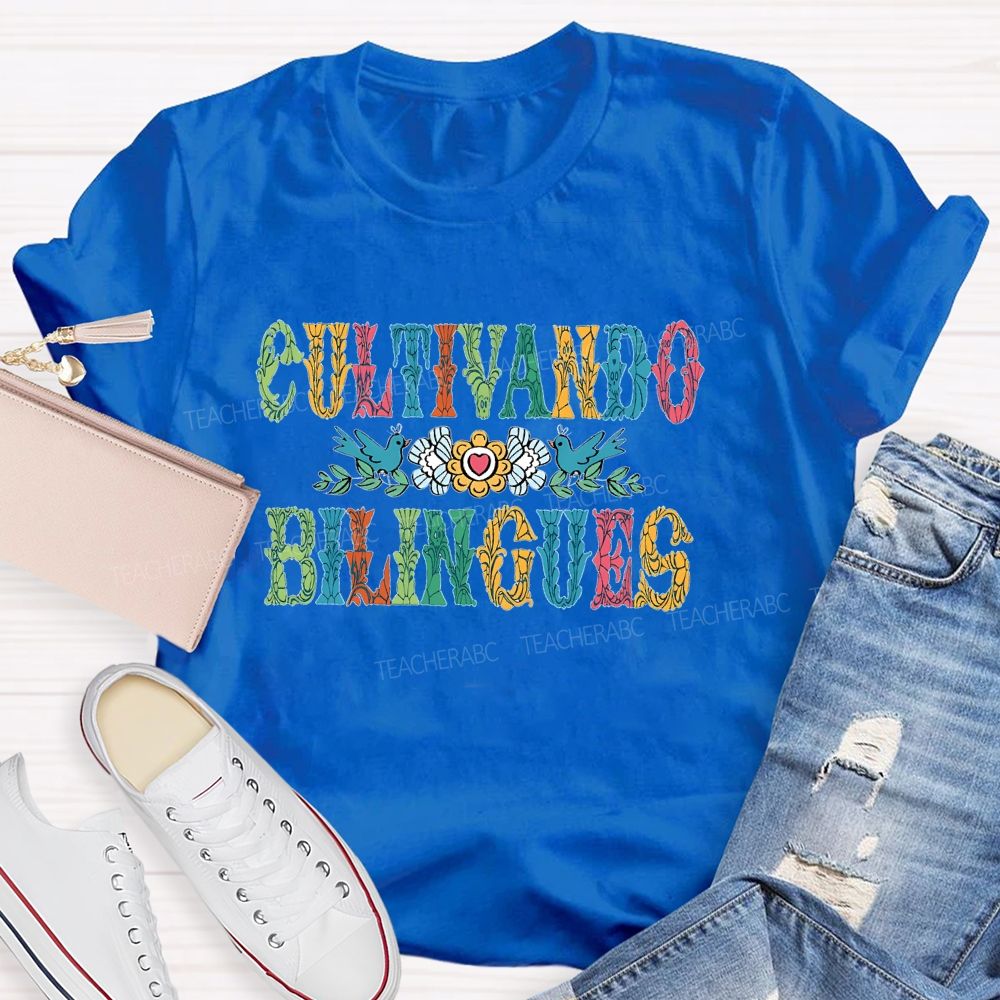 Cultivando Bilingues Colorful Letters  Teacher T-shirt