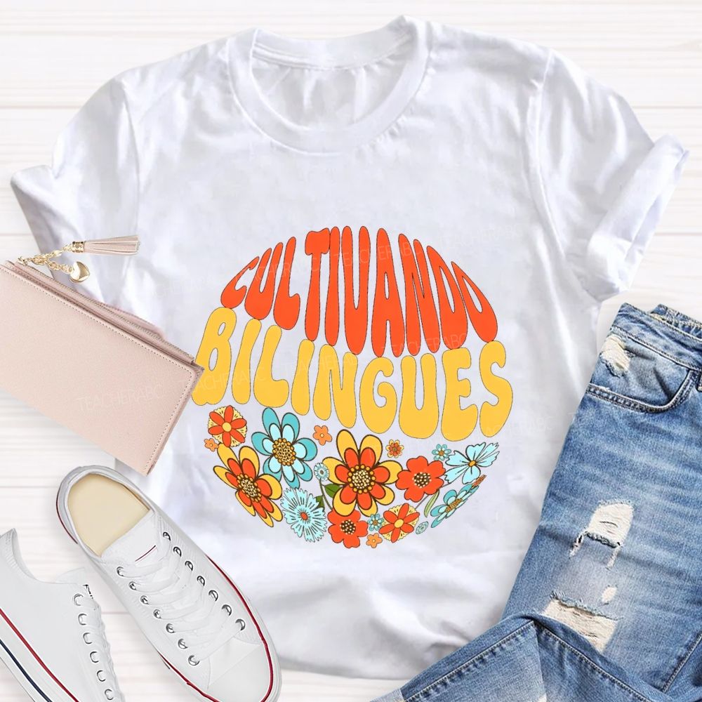 Cultivando Bilingues And Colorful Flowers Teacher T-shirt