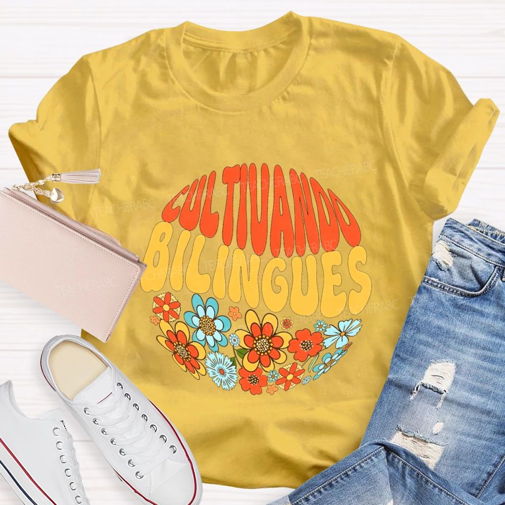 Cultivando Bilingues And Colorful Flowers Teacher T-shirt